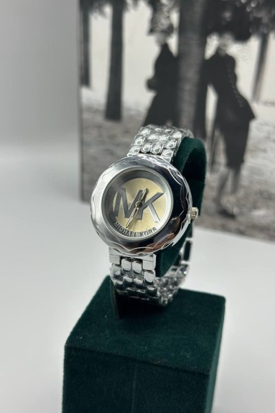 Michael Kors Gümüş Yuvarlak Kadın Kol Saat S772 Michael Kors Gümüş Yuvarlak Kadın Kol Saat S772